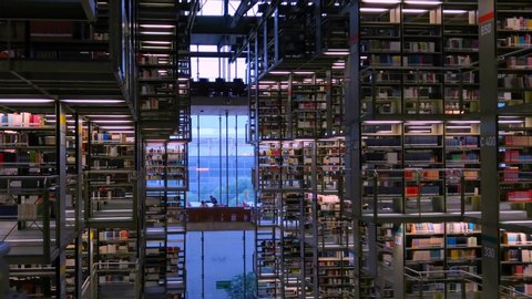 Mexico City - Novemver 17, 2018: Panoramic panning of the amazing shelves full of books from the huge Vasconcelos library