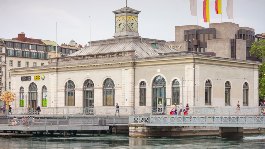evening time geneva city riverside famous post building panorama 4k timelapse switzerland