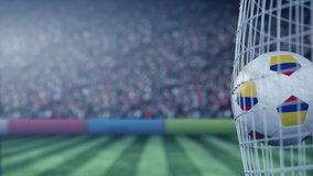 Flag of Colombia on the football hitting goal net back. Realistic slow motion 3D animation - Powered by Shutterstock - Get 15% off with code: PIKWIZARD15