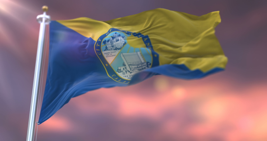 Flag of Santa Ana city at sunset, California, United States of America - loop