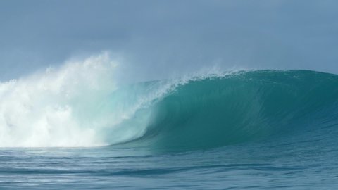 Big beautiful clean wave - slowmotion - barreling - Indonesia