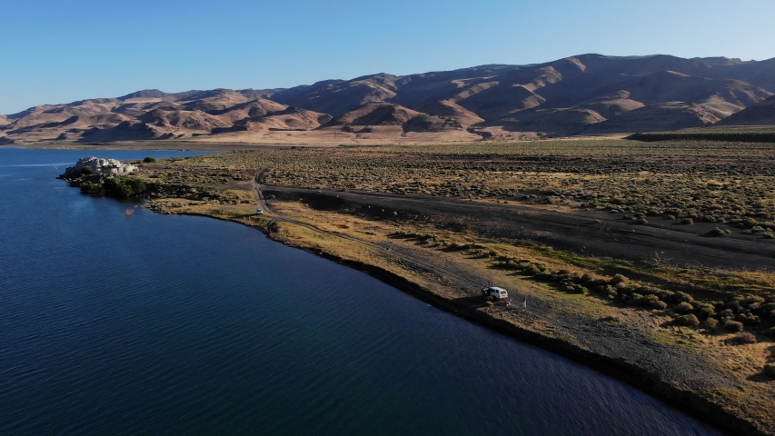 Shoreline of Pyramid Lake with Trucks - Aerial Drone.