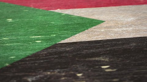 Flag Of Sudan. Detail On Wood, Shallow Depth Of Field, Seamless Loop. High-Quality Animation. Ideal For Your Country / Travel / Political Related Projects. 1080p, 60fps.