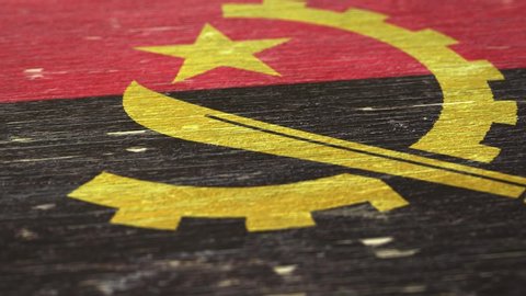 Flag Of Angola. Detail On Wood, Shallow Depth Of Field, Seamless Loop. High-Quality Animation. Ideal For Your Country / Travel / Political Related Projects. 1080p, 60fps.