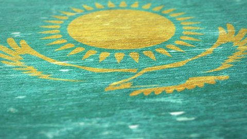 Flag Of Kazakhstan. Detail On Wood, Shallow Depth Of Field, Seamless Loop. High-Quality Animation. Ideal For Your Country / Travel / Political Related Projects. 1080p, 60fps.