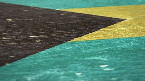 Flag Of Bahamas. Detail On Wood, Shallow Depth Of Field, Seamless Loop. High-Quality Animation. Ideal For Your Country / Travel / Political Related Projects. 1080p, 60fps.