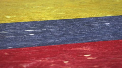 Flag Of Colombia. Detail On Wood, Shallow Depth Of Field, Seamless Loop. High-Quality Animation. Ideal For Your Country / Travel / Political Related Projects. 1080p, 60fps.