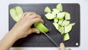 Video of fresh apple cutting on slices