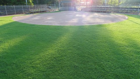 An empty baseball field on a warm summer evening 4k footage