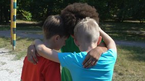 Street football players hugging before match, teamwork support ritual, strategy - Powered by Shutterstock - Get 15% off with code: PIKWIZARD15