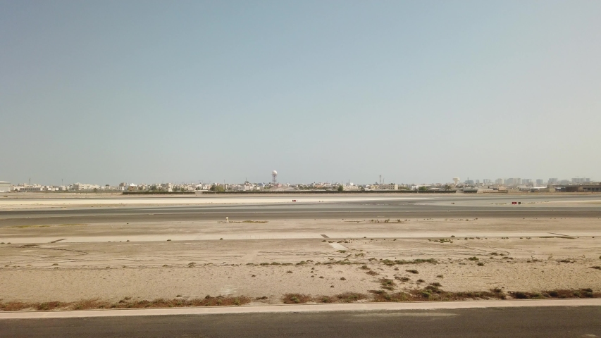 The plane is taking off at Bahrain International Airport which is the biggest airport in Bahrain. View from the air plane.

