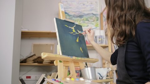 two female artists sketching nude model Stock Footage Video (100%