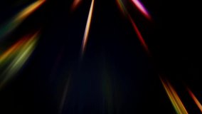 Glowing rays motion. Hypersonic speed. Blur neon multicolor beams flow on dark background.