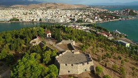 Aerial drone video of historic landmark Medieval castle of Karababa in town of Halkida or Chalkida, Evoia island, Greece