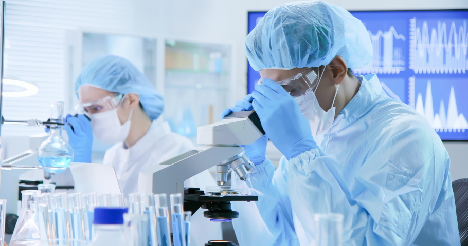 Asian biotechnology scientist team has researching in the laboratory | Shutterstock HD Video #1038534620