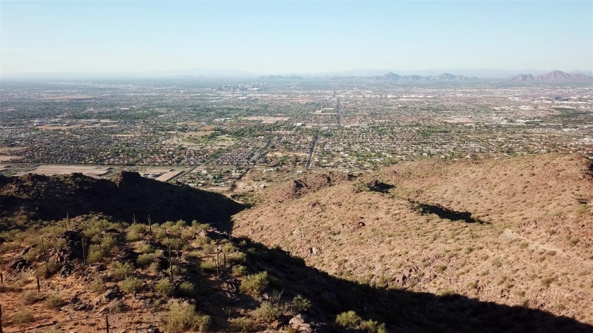 Aerial footage over Phoenix Ladscape From High Mountain view
Drone view over Phoenix Arizona landscape From High point of View 
