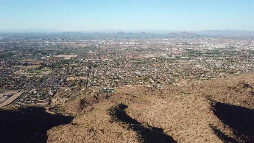 Aerial footage over Phoenix Ladscape From High Mountain view
Drone view over Phoenix Arizona landscape From High point of View 
