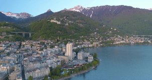 4k drone aerial footage of montreux with dent du midi in winter