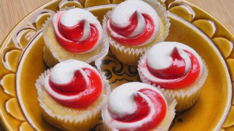 Rotating plate of strawberry shortcake mini cupcakes
