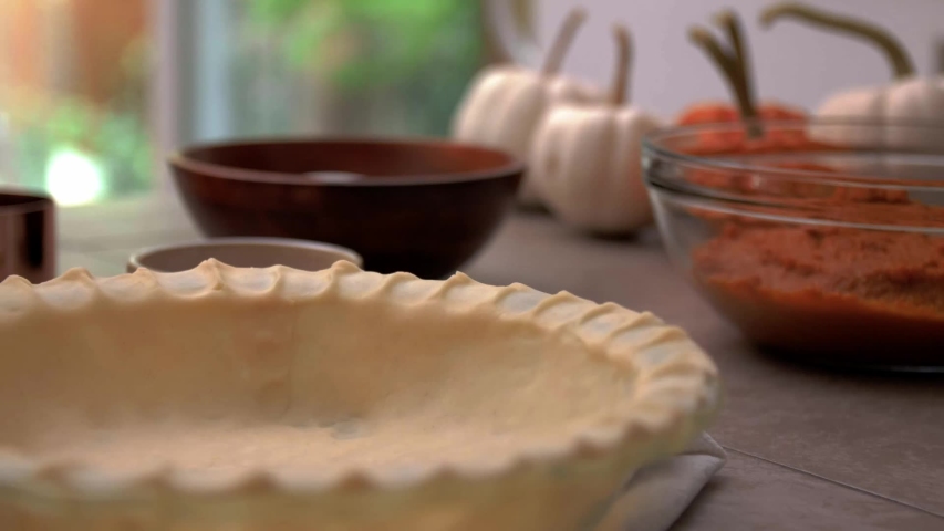 Ingredients for pumpkin pie waiting on a counter top 