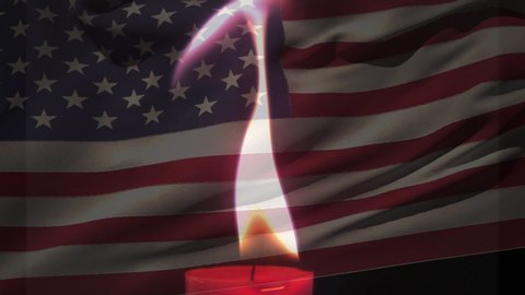 Animation of a lit candle burning with a US flag billowing in the background