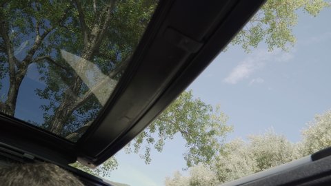 Close roof of convertible car close up inside view 4k. Blue sky hot summer day