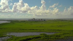 Aerial video of the Turkey Point Nuclear power generation plant in Homestead FL 4k