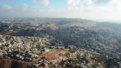 The old city of Jerusalem Aerial fligt view
Daylight Drone view over East Jerusalem And silwan neighborhood
