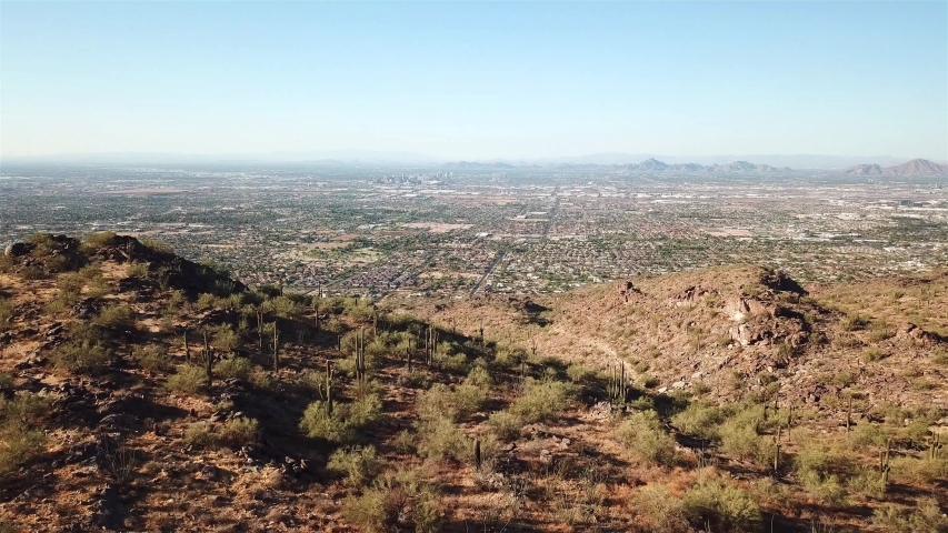 Aerial footage over Phoenix Ladscape From High Mountain view
Drone view over Phoenix Arizona landscape From High point of View 
