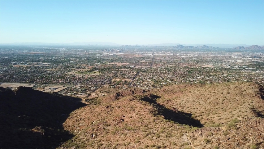 Aerial footage over Phoenix Ladscape From High Mountain view
Drone view over Phoenix Arizona landscape From High point of View 
