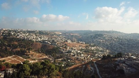 Aerial Footage of The old City of Jerusalem and  Mount of Olives
Drone footage over Abu Tor neighborhood In East Jrusalem With The old City and mount of olives, Israel
