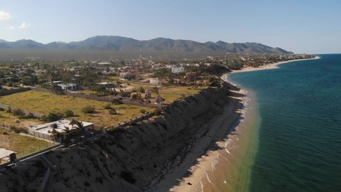 An aerial view of La Ventana, a quiet coastal town outside of La Paz on the Baja California coast of Mexico along the Gulf of California with a view of Isla Ceralvo island. 
