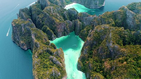 Aerial view of iconic tropical turquoise water Pileh Lagoon surrounded by limestone cliffs, Phi Phi islands, Thailand