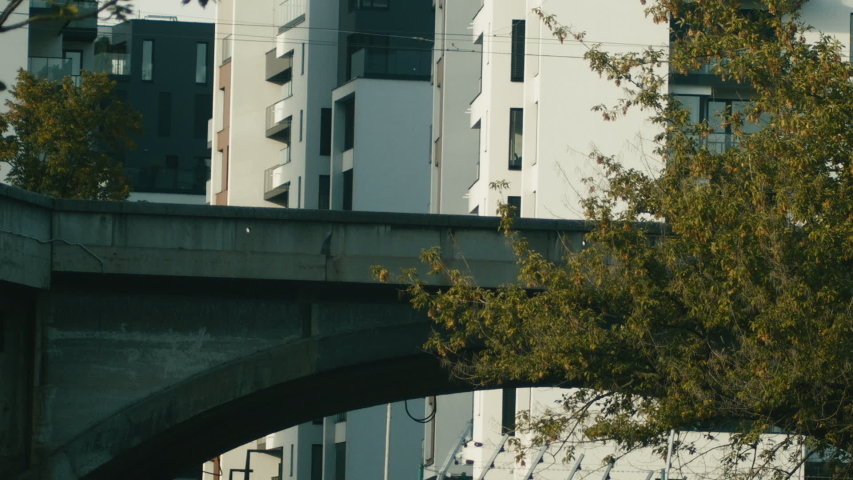 Modern Tram Passing Over Bridge. Public City Transportation in Prague Czech Republic