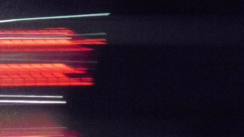 Super fast cars lights. Night motion time lapse. Hyper speed - urban movement loop. Minimal background texture. Modern cityscape - blurred night street road traffic. 