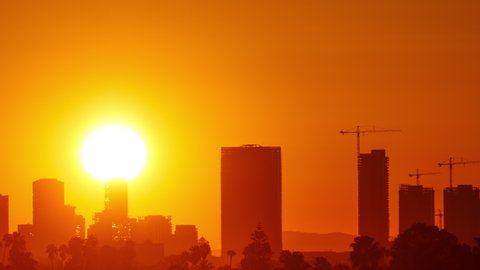 Time Lapse of the sun rising from behind downtown Los Angeles