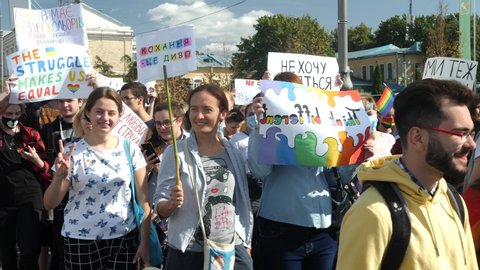 KHARKIV, UKRAINE - September 15, 2019: People attend LGBT pride event. Claiming for equality and legal rights for LGBTQI+ community. Rainbow flag at gay or lesbian pride parade