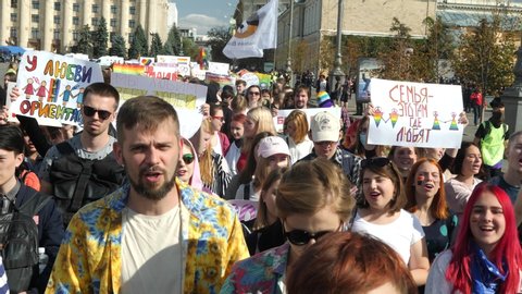 KHARKIV, UKRAINE - September 15, 2019: People attend LGBT pride event. Claiming for equality and legal rights for LGBTQI+ community. Rainbow flag at gay or lesbian parade