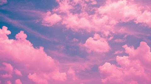 Beautiful pink sky and cloudscape background Timelapse picture.Bright pink sky fluffy  cloud are fast moving like a heaven.18 Sec, 30 fps footage of 4K timelapse cloudscape.