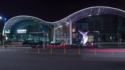 KAOHSIUNG, TAIWAN - 2019 circa: Night view of Kaohsiung Exhibition Center, a convention center designed by Australian architect, Philip Cox, and opened on 14 April 2014. 4K hyperlapse