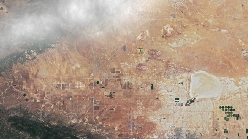 Clouds over Pacific crest trail path with mountains. Contains public domain image by Nasa