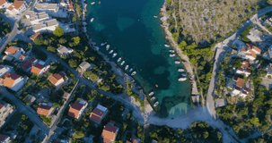 Drone video of Beautiful nature and landscape in Kanica Croatia Europe. Nice sunny colorful day at Adriatic Sea in Dalmatia. Calm, peaceful and happy outdoors.