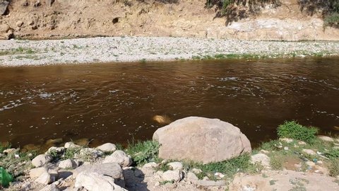 The slowing waters of the Zarqa River also know as Jabbok River from Biblical times.