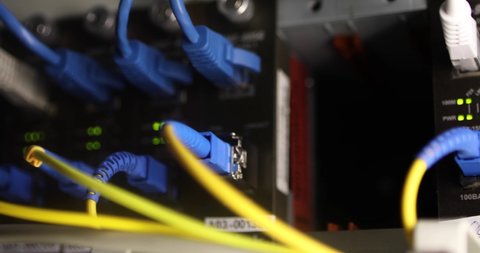 Panning Along The Server Racks In High Tech Internet Data Center Room