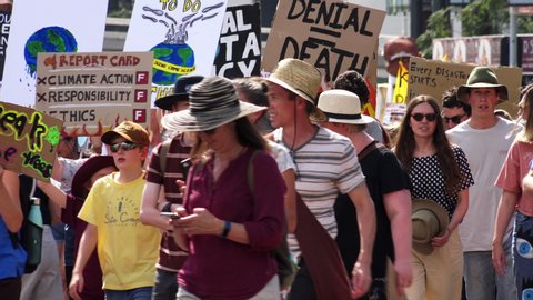 BRISBANE, AUSTRALIA - 20th September 2019 - A tight shot of protestors showing their colour, commitment and creativity as shut down part of the Brisbane CBD for Strike for Climate rally.