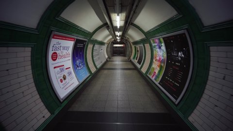 LONDON, ENGLAND - SEPTEMBER 10, 2019: London underground subway train station, metro path. Concept of British modern urban life, UK city lifestyle, corporate business work.