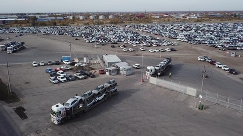Truck Carrying New Cars from Big Parking. Vehicle Logistics, transport fleets