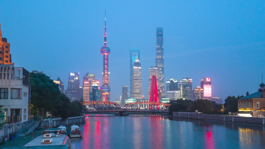 time lapse of sunset, Shanghai skyline and Waibaidu bridge, China Royalty-Free Stock Footage #1038774002