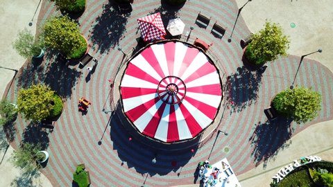 Aerial view of red and white spinning carousel at Moscow