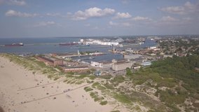 ship going in to Harbor Ventspils Latvia Aerial view of countryside drone top view 4K UHD video